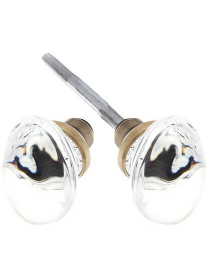 Pair of Oval Clear Crystal Knobs in Antique Brass.